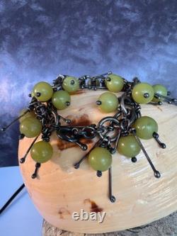 Artist made, sterling silver and green glass contempory bracelet