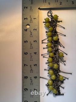 Artist made, sterling silver and green glass contempory bracelet