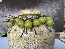 Artist made, sterling silver and green glass contempory bracelet