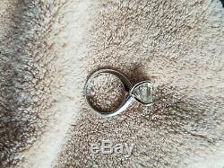 Custom made 925 sterling silver moissanite ring, lightly worn