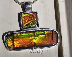 Custom made Sterling Silver Ammolite Pendant with 18 sterling. 925 snake chain