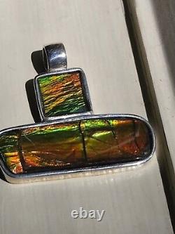 Custom made Sterling Silver Ammolite Pendant with 18 sterling. 925 snake chain