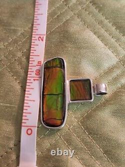 Custom made Sterling Silver Ammolite Pendant with 18 sterling. 925 snake chain