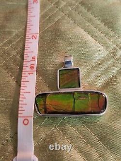 Custom made Sterling Silver Ammolite Pendant with 18 sterling. 925 snake chain