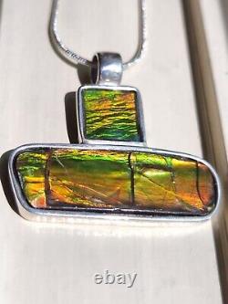 Custom made Sterling Silver Ammolite Pendant with 18 sterling. 925 snake chain