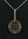 Danish silver pendant designed and made by Arne Johansen and set with stri Agate