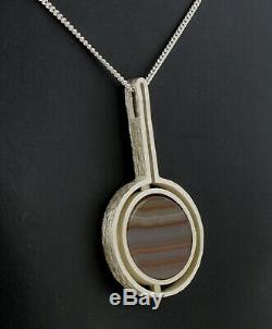 Danish silver pendant designed and made by Arne Johansen and set with stri Agate