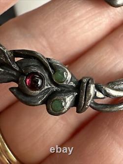 Gorgeous artisan made sterling silver Lady brooch with garnets and emeralds
