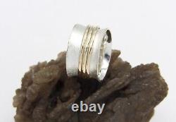 Hand made Solid. 925Sterling Silver and Solid 10K Yellow Gold Three Spinner Bands