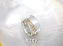 Hand made Solid. 925Sterling Silver and Solid 10K Yellow Gold Three Spinner Bands