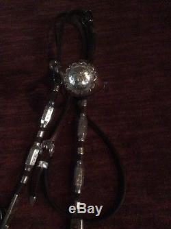 Headstall made by Vogt. Sterling Silver and Leather