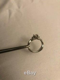 Long's custom made 3 stone engagement ring. With GIA Certification