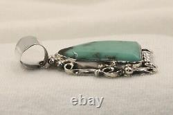 Signed Native American Navajo Made Sterling Silver Godber Mine Turquoise Pendant