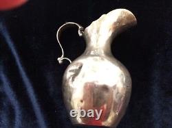 Small sterling silver jug made in England