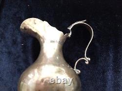 Small sterling silver jug made in England