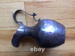 Small sterling silver jug made in England