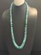 Sterling Silver Graduated Turquoise Bead Necklace. 34 Inch