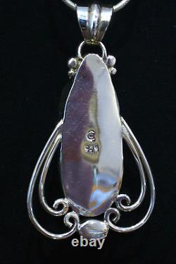 Sterling Silver Hand Carved Double Wolves Head Artisan Made Opal Pendant