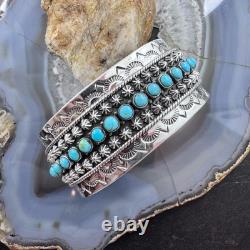 Sterling Southwestern Style Turquoise Single Row Stamped Decorated Bracelet