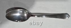 This sterling flatware piece is in the Lotus pattern Made by the Watson Company
