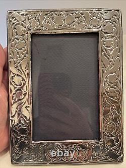 Vintage British made sterling silver 6x4 frame made in London In 1983 Floral