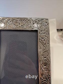 Vintage British made sterling silver 6x4 frame made in London In 1983 Floral