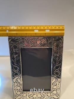 Vintage British made sterling silver 6x4 frame made in London In 1983 Floral