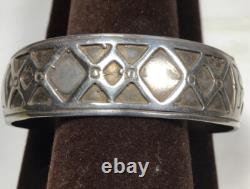 Vintage Navajo Made sterling silver Overlay cuff bracelet. X's And Spade Design