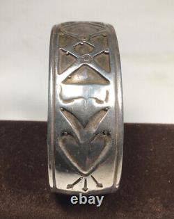 Vintage Navajo Made sterling silver Overlay cuff bracelet. X's And Spade Design