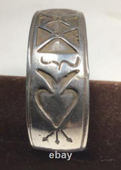 Vintage Navajo Made sterling silver Overlay cuff bracelet. X's And Spade Design