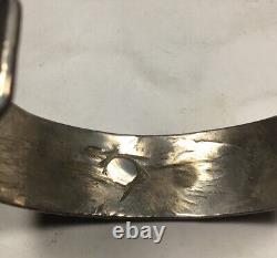 Vintage Navajo Made sterling silver Overlay cuff bracelet. X's And Spade Design