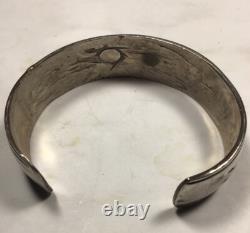 Vintage Navajo Made sterling silver Overlay cuff bracelet. X's And Spade Design